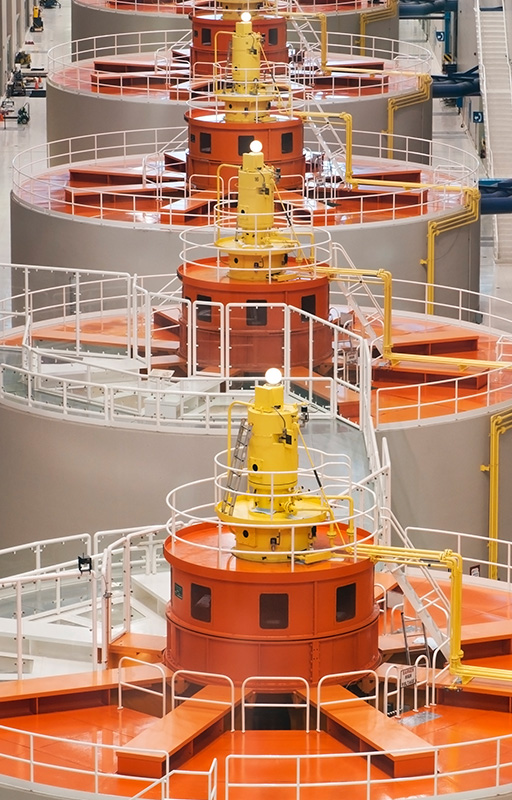 Photograph of a row of hydro-power generators.