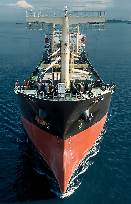 View of a cargo ship at sea.